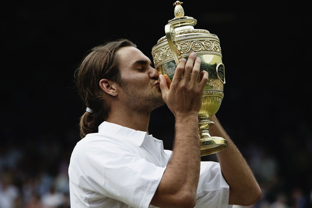 Roger Federer celebrates his Wimbledon win of 2003