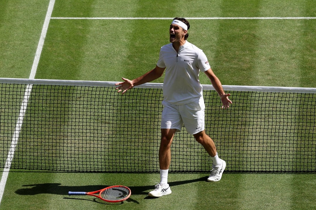 Taylor Fritz celebrates his win over Karen Khachanov to reach the Wimbledon semifinals